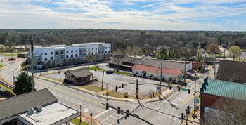 an aerial view of a city street and buildings